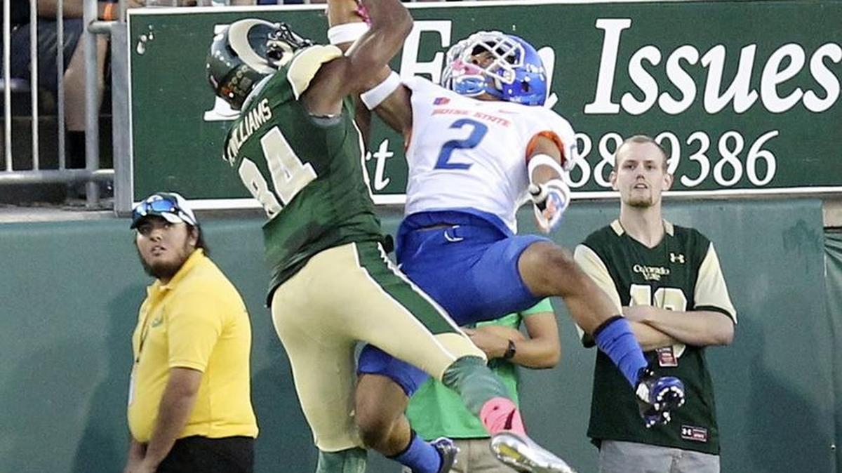 Boise State cornerback Jonathan Moxey, right, is working on controlling his emotion and leading the secondary.