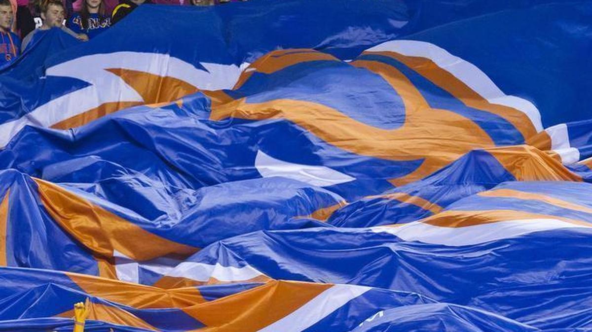 Boise State’s student section raises a Bronco flag above their heads at the 8:30 p.m. kick-off against Utah State Saturday Oct. 1, 2016 at Albertsons Stadium in Boise.