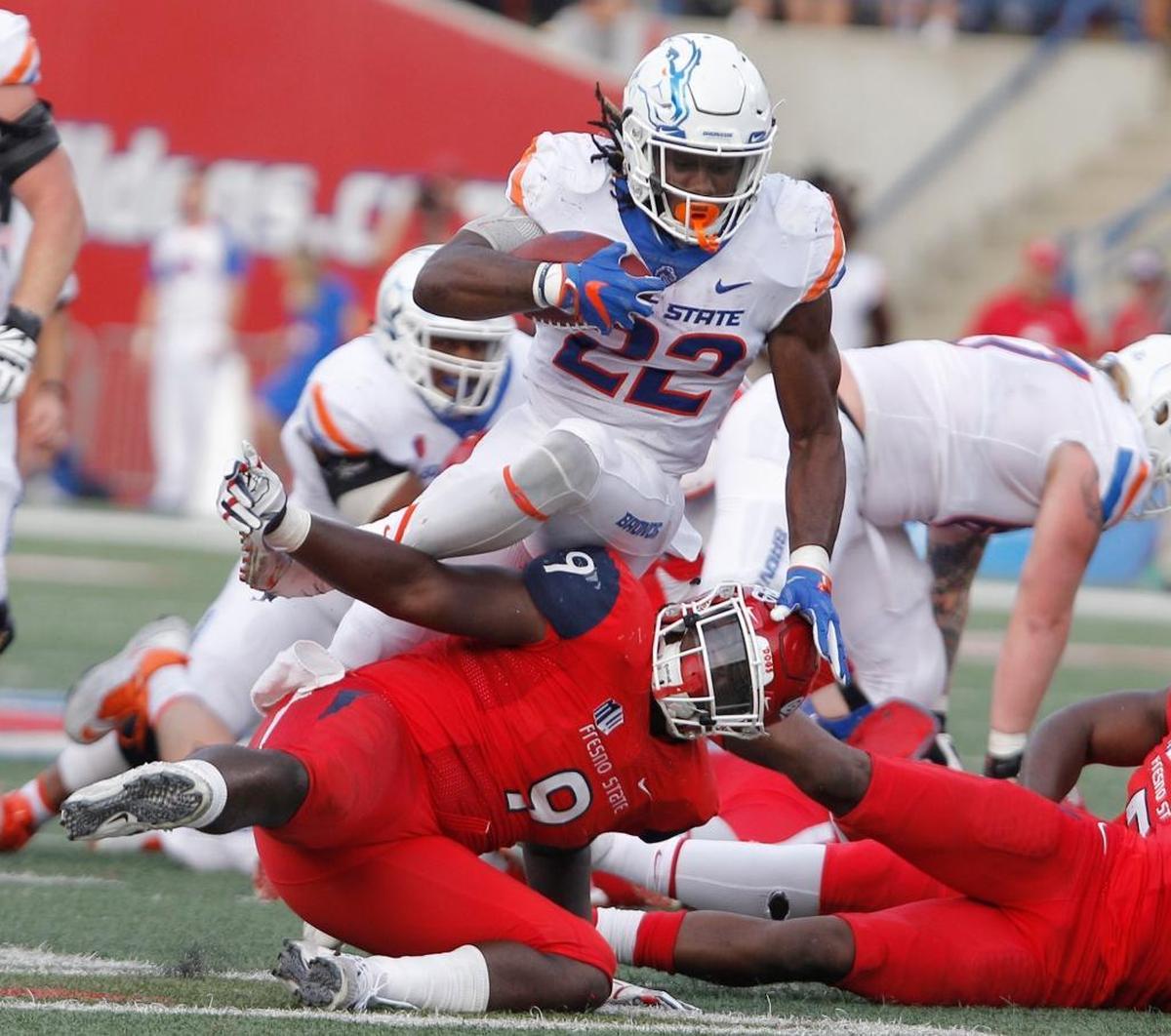 Fresno State linebacker Jeffrey Allison tries to upend Boise State running back Alexander Mattison during the second half last week in Fresno, Calif.