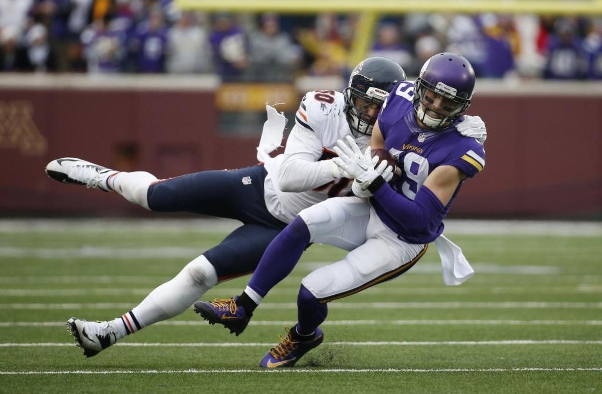 Minnesota wide receiver Adam Thielen, right, has a touchdown reception in all three games of the Vikings’ three-game winning streak.