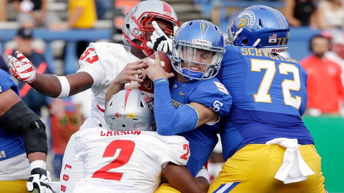 New Mexico linebacker Kimmie Carson (2) sacks during San Jose State quarterback Kenny Potter during their game Oct. 24 in San Jose, Calif.