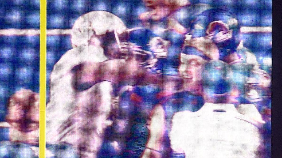 Boise State fans watch in shock as video of Oregon running back LeGarrette Blount slugging Boise State’s Byron Hout is played repeatedly following the Broncos’ 19-8 win in 2009 at Bronco Stadium.