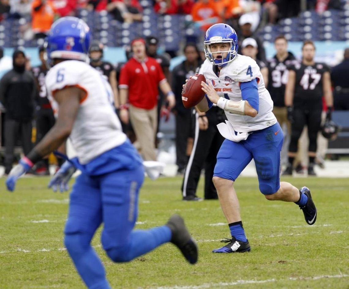 In his last game, Brett Rypien, right, threw for 377 yards and three touchdowns during Boise State’s 55-7 Poinsettia Bowl rout of Northern Illinois on Dec. 23.