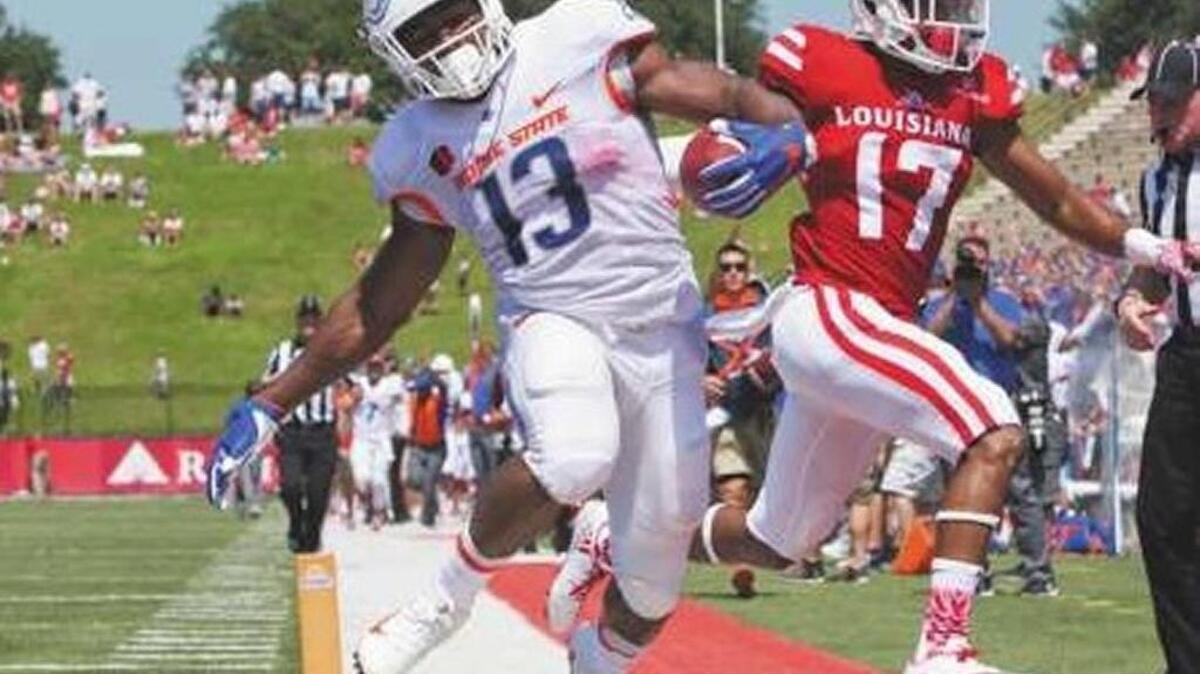 Boise State running back Jeremy McNichols scores a touchdown in the Broncos’ season opener Sept. 3 at Louisiana in Lafayette, La.
