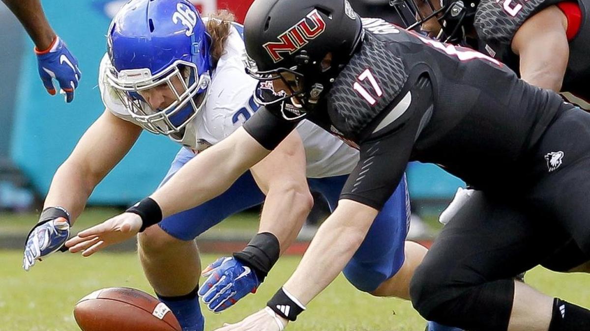 Boise State linebacker Tyler Gray jumps on a Northern Illinois fumble by quarterback Ryan Graham in the Poinsettia Bowl on Wednesday, Dec. 23, 2015, at Qualcomm Stadium in San Diego.