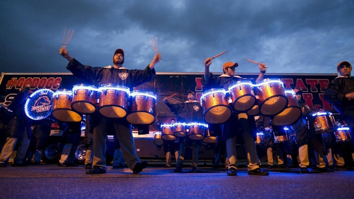 The Boise State band plays lighted drum sets outside of Alberstons Stadium before the Mountain West Championship game against Fresno State in 2014.