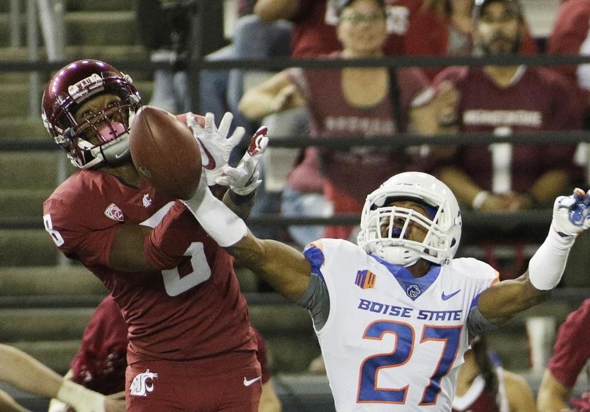 Boise State cornerback Reid Harrison-Ducros disrupts a pass intended for Washington State wide receiver Tavares Martin Jr.