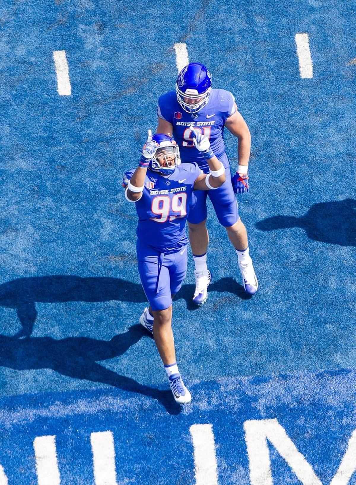 Boise State linebacker/end Curtis Weaver (99) celebrates a sack during the home opener against Troy.