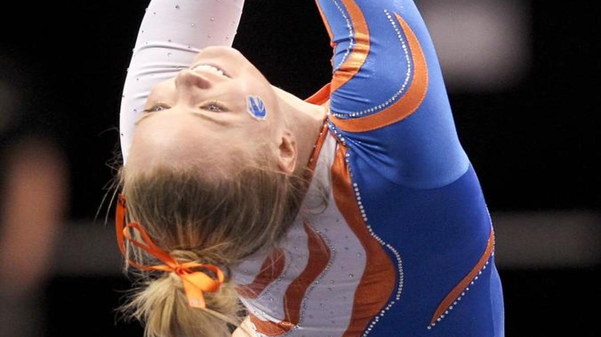 Boise State gymnast Krystine Jacobsen ends her floor routine at the Mountain Rim Gymnastics Conference championships Saturday, March 19, 2016, at Taco Bell Arena in Boise.
