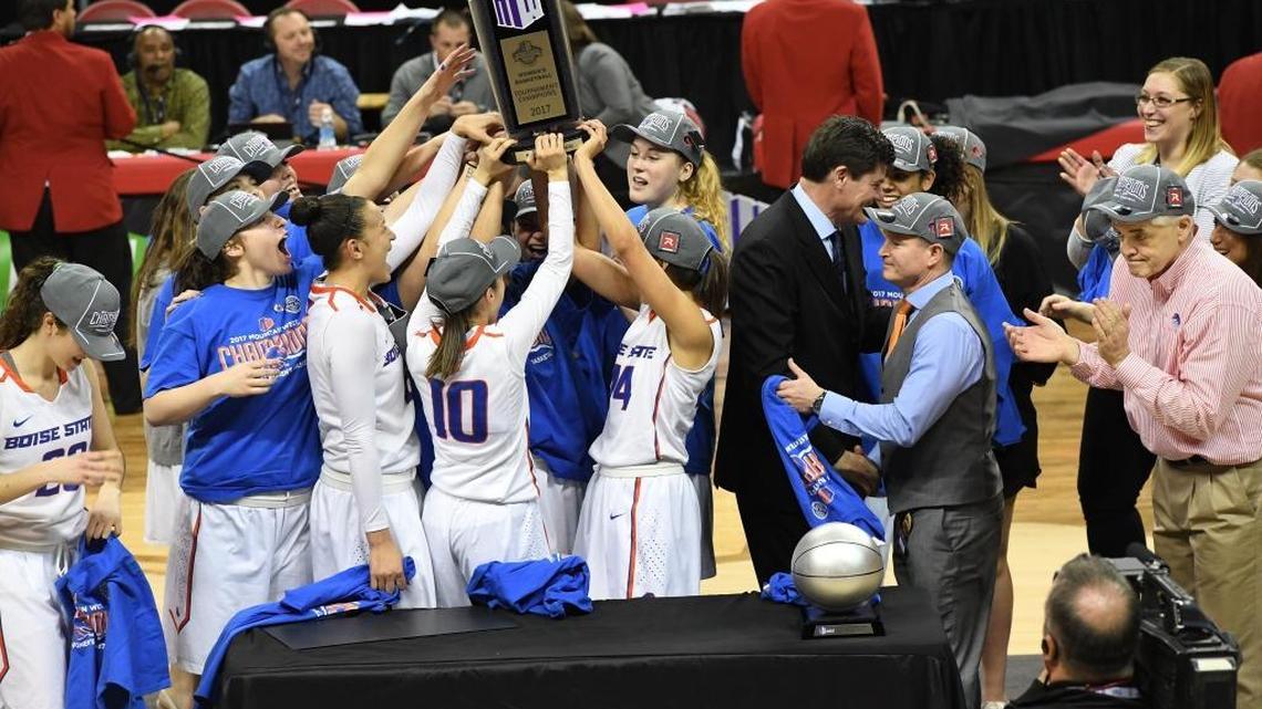 The Boise State women’s basketball team collects its championship trophy after winning the Mountain West Tournament in Las Vegas on Friday. The Broncos are headed to the NCAA Tournament for the fourth time in history.