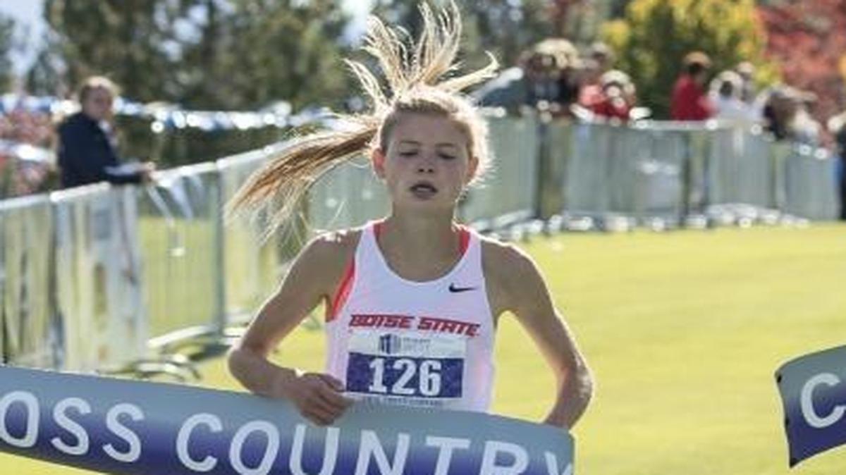 Allie Ostrander, shown winning the 2015 Mountain West title in cross country, returned to the sport Saturday by winning the Greater Louisville Classic. She missed the 2016 season with an injury.