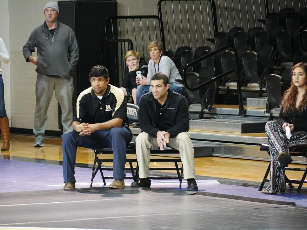 Northeastern Junior College (Colorado) coach Mike Mendoza, right, is seen with assistant Adam Fierro during a recent dual. Mendoza said having wrestlers for just two years is a big change from Boise State. “It was surprising the way things unfolded, but there were a lot of people in our corner, and I appreciate they fought for us,” Mendoza said.