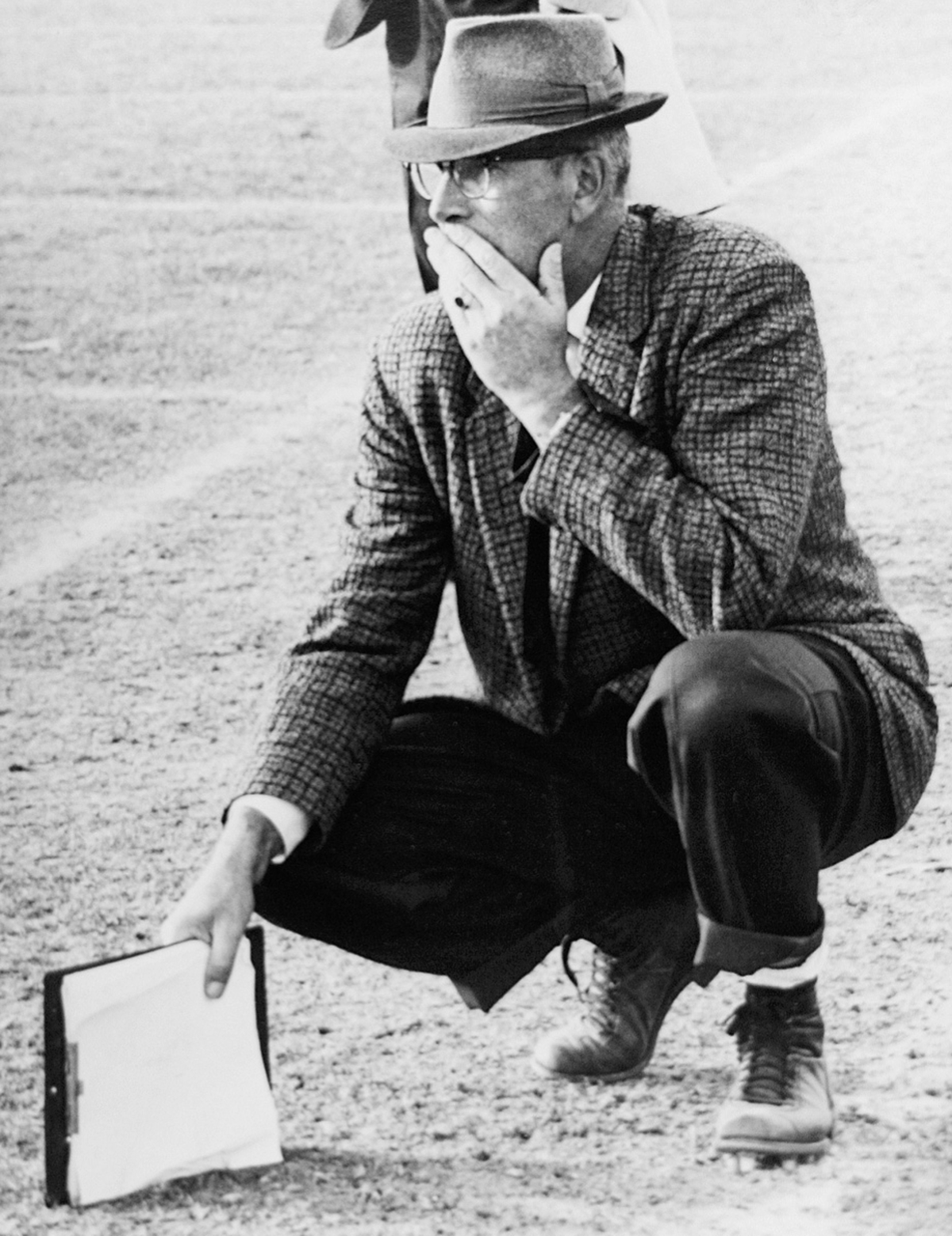 Lyle Smith, the Broncos’ football coach for 20 years, wore a blue fedora and carried a clipboard on the sideline. He was sometimes known to stomp on the hat or toss the clipboard.