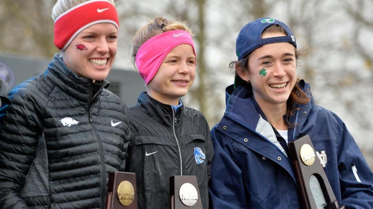 Senior Molly Seidel of Notre Dame, right, won the women’s cross country national championship in Louisville, Ky., on Saturday, followed by the Broncos’ Allie Ostrander, middle. Seidel finished the 6k course in 19 minutes, 28.6 seconds; Ostrander ran a 19:33.6 and finished more than 7 seconds ahead of third-place finisher Dominique Scott of Arkansas, left. New Mexico won the women’s title and Syracuse won the men’s race.