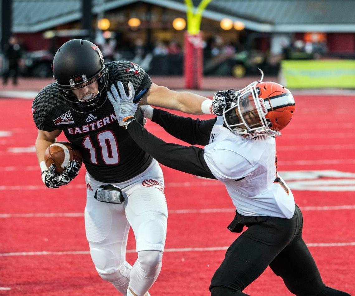 Eastern Washington wide receiver Cooper Kupp fights for yards against Idaho State defensive back Anthony Ricks during their college football game Saturday, Nov. 12, 2016, in Cheney, Wash.