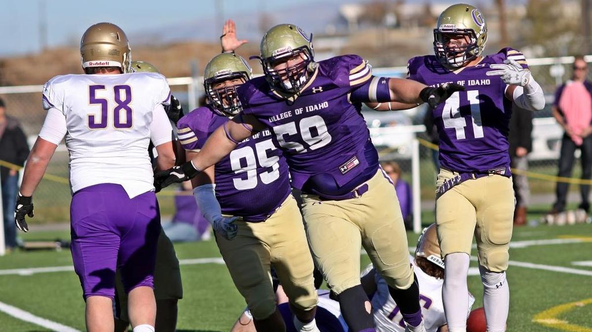 College of Idaho sophomore defensive tackle Josh Price (Borah High) celebrates after a fourth quarter sack that helped preserve the Yotes’ victory over Carroll College.