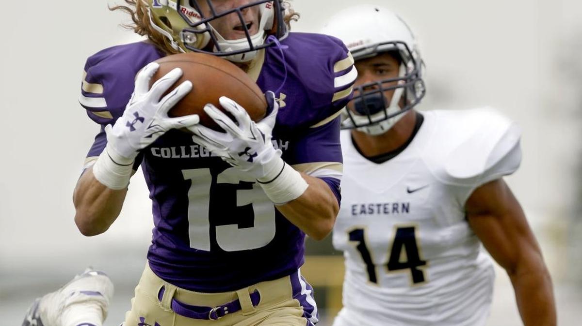 College of Idaho wide receiver Tyler Higby (Borah High) catches a long touchdown pass in the 2015 season opener against Eastern Oregon on Aug. 30 at Simplot Stadium in Caldwell.