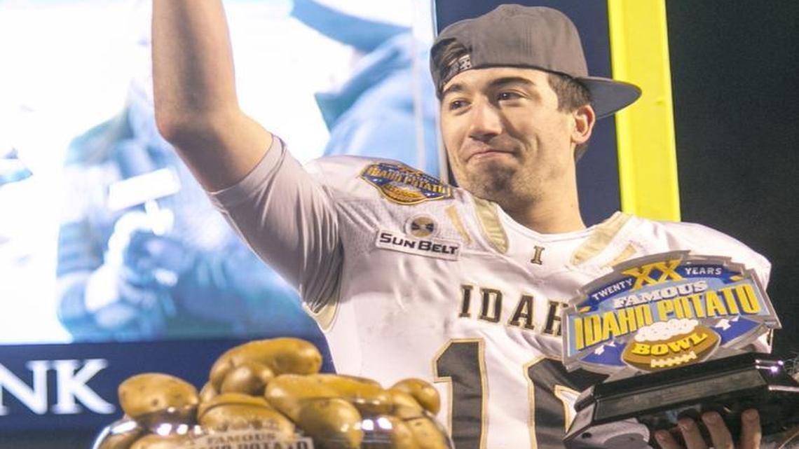 Idaho quarterback Matt Linehan (10) holds the Most Valuable Player trophy after the Famous Idaho Potato Bowl held at Albertsons Stadium on Thursday, Dec. 22, 2016. Idaho beat Colorado State 61-50.
