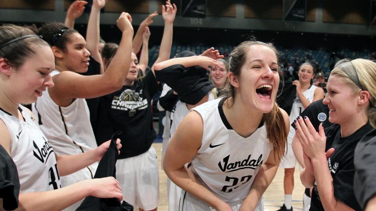 Idaho forward Renae Mokrzycki (23) celebrates with her team after Idaho defeated Idaho State 67-55 in an NCAA college basketball game for the Big Sky Conference women's tournament title in Reno, Nev., Saturday, March 12, 2016.