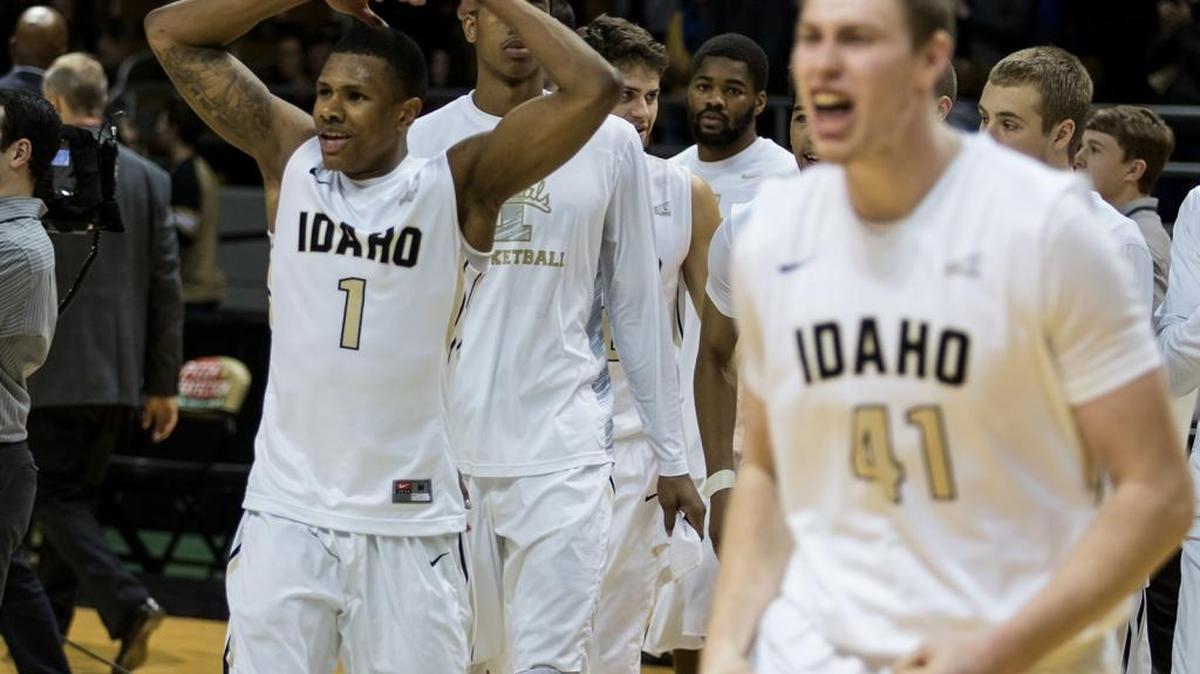 Ty Egbert (41) and Perrion Callandret (1) and their Idaho teammates celebrate their nonconference victory over Washington State on Thursday night in Moscow.