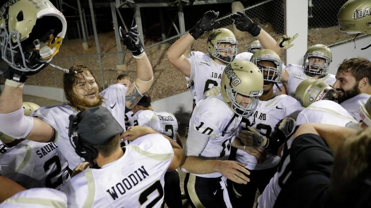Idaho players celebrate after defeating UNLV in overtime Saturday, Sept. 24, 2016, in Las Vegas. Idaho won 33-30.
