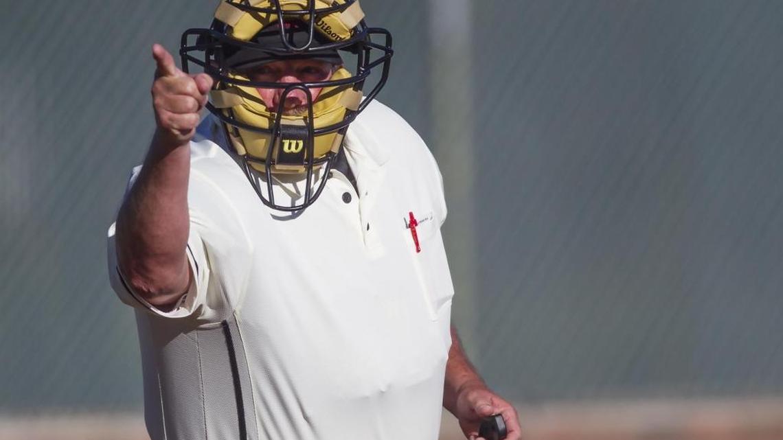 Umpire Frank Harper calls a strike during an American Legion baseball game at Capital High in Boise. Unlike Harper, who has been umpiring for six years, only two of every 10 referees continue after their second year.