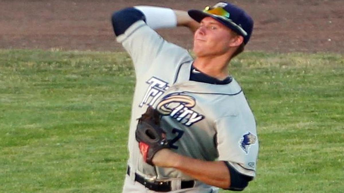 Rocky Mountain High graduate Mason Smith throws to third base during Opening Day at Boise’s Memorial Stadium in 2015 while playing with the Tri-City Dust Devils.