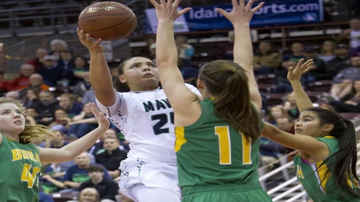 Mountain View senior Destiny Slocum drives through meets Borah’s defense in the first round of the 5A state tournament Feb. 18, 2016, at the Ford Idaho Center in Nampa. Slocum played in the Jordan Brand Classic on Friday at the Barclays Center in New York.