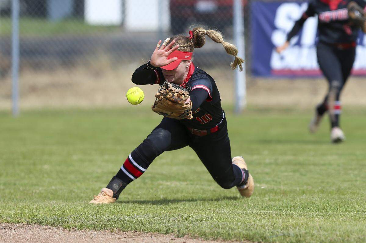 Owyhee’s Saylor Shoemaker lays out trying to make a catch in center field during the 6A softball state championship round Saturday at Coeur d’Alene High.