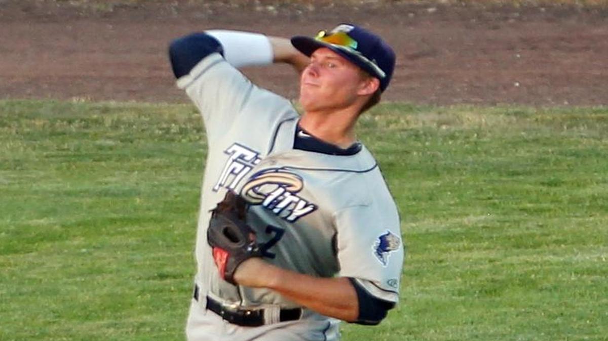Mason Smith throws to third base during opening night at Boise’s Memorial Stadium while with the Tri-City Dust Devils last season.