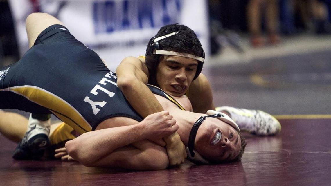 Columbia’s Angel Rios enters as the No. 1 seed in arguably the tougest division in any state tournament — 4A’s 138-pound bracket. Above, Rios pins Bishop Kelly’s Jack McChesney in the 132-pound weight class at the Rollie Lane Invitational in January.