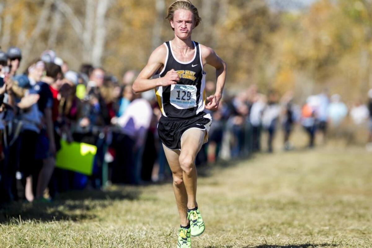 Bishop Kelly’s Nicholas Russell turned in the fastest time in any classification on his way to repeating as the 4A boys state champ Saturday at Eagle Island State Park.