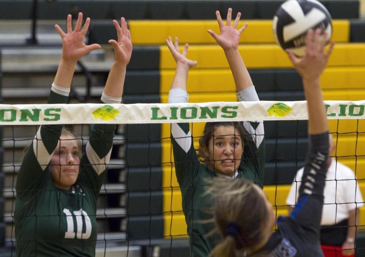 Eagle’s Emily Greer, left, earned a spot on the 5A first-team all-state volleyball team. She’s one of three Mustangs to make the all-state team.