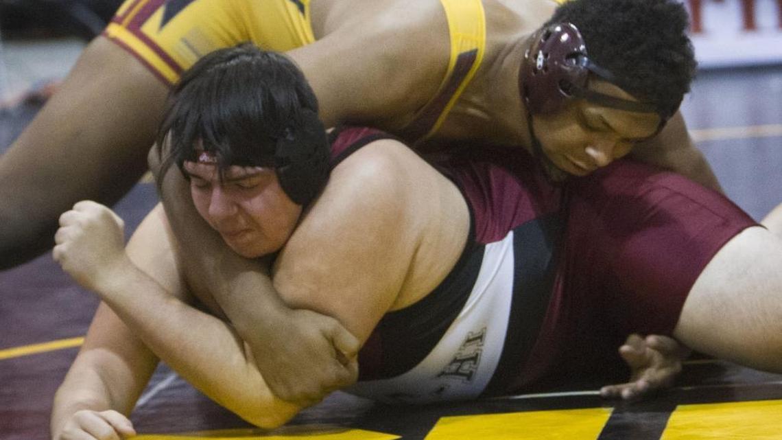 Columbia High’s Brandon Kipper, top, pinned Cruz Garcia from Oregon’s McLoughlin/Weston-McEwen in 13 seconds Friday in the heavyweight division of the Rollie Lane Invitational at the Ford Idaho Center. The wrestling tournament continues Saturday.