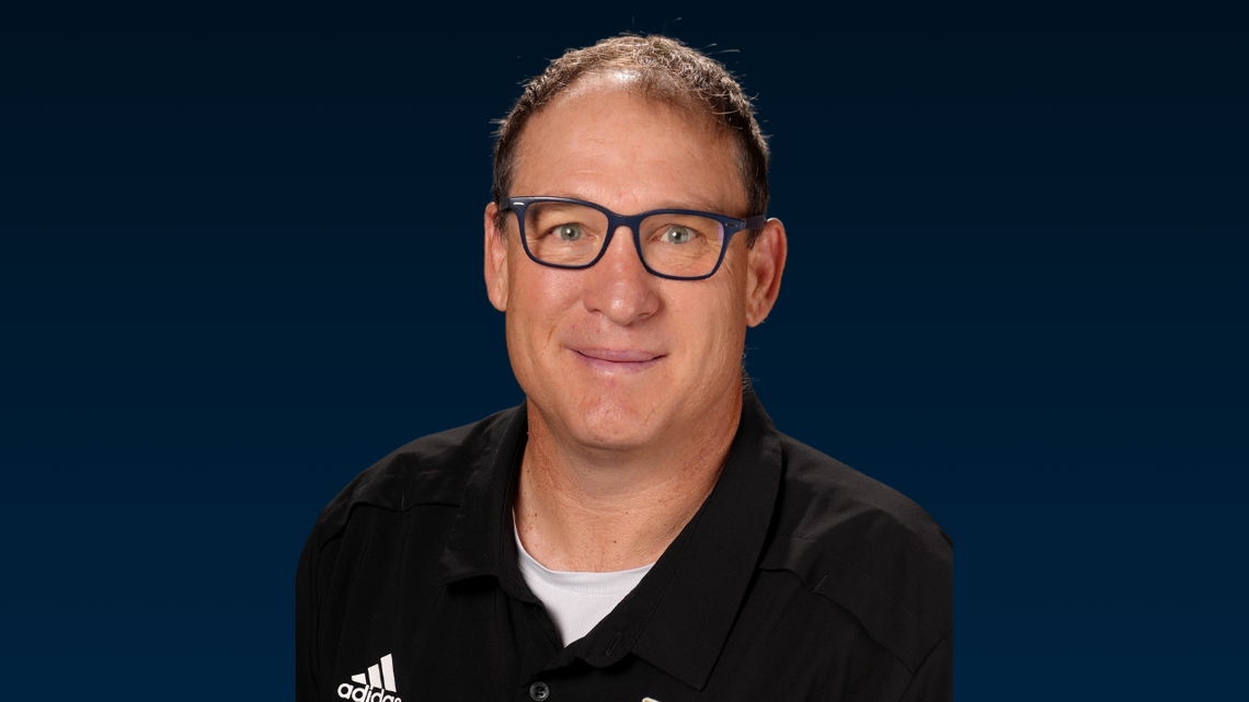 Capital hires a new football coach. His plan to revive the former powerhouse