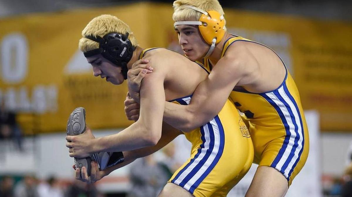 Caldwell’s Cyrus Salcedo, right, edged teammate Julian Barrientez for the 4A 132-pound title in February. Salcedo leads a potent Caldwell squad that won its first team title last season and has its eyes set on another.