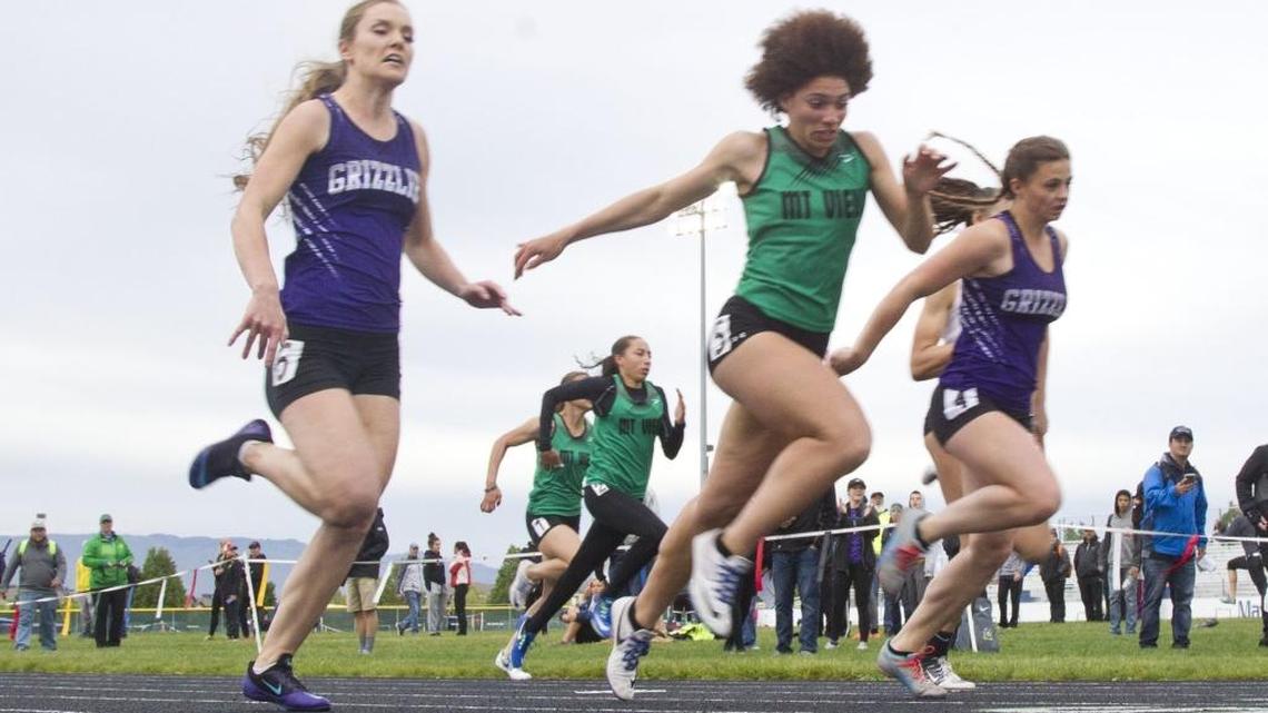 The finish to the girls 100 meters at the 5A District Three track and field meet was too close to call. Who will win the state final Saturday at Dona Larsen Park?