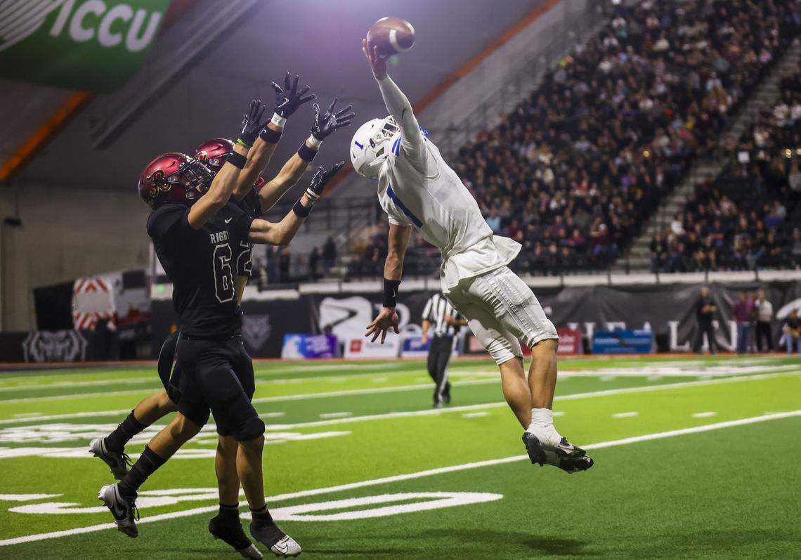 Timberline senior Hudson Lewis tries to grab a one-handed catch during a 41-6 loss to Rigby in the 6A state championship game Saturday at Pocatello’s ICCU Dome. 