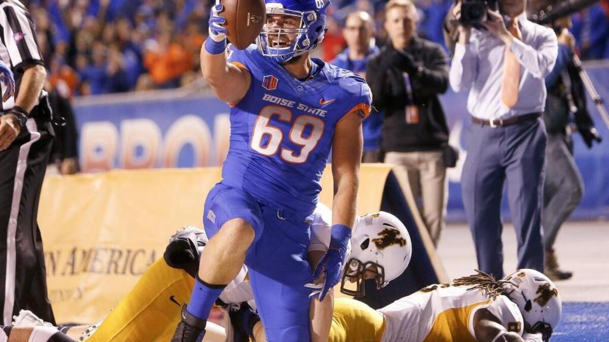 Tyler Horn celebrates his only catch as a Bronco, an interception against Wyoming on Oct. 24.