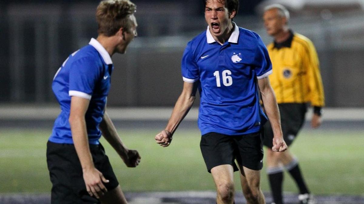 Timberline’s Rowen Pierson celebrates with teammates as the Wolves repeated as 5A state champions at Rocky Mountain High.