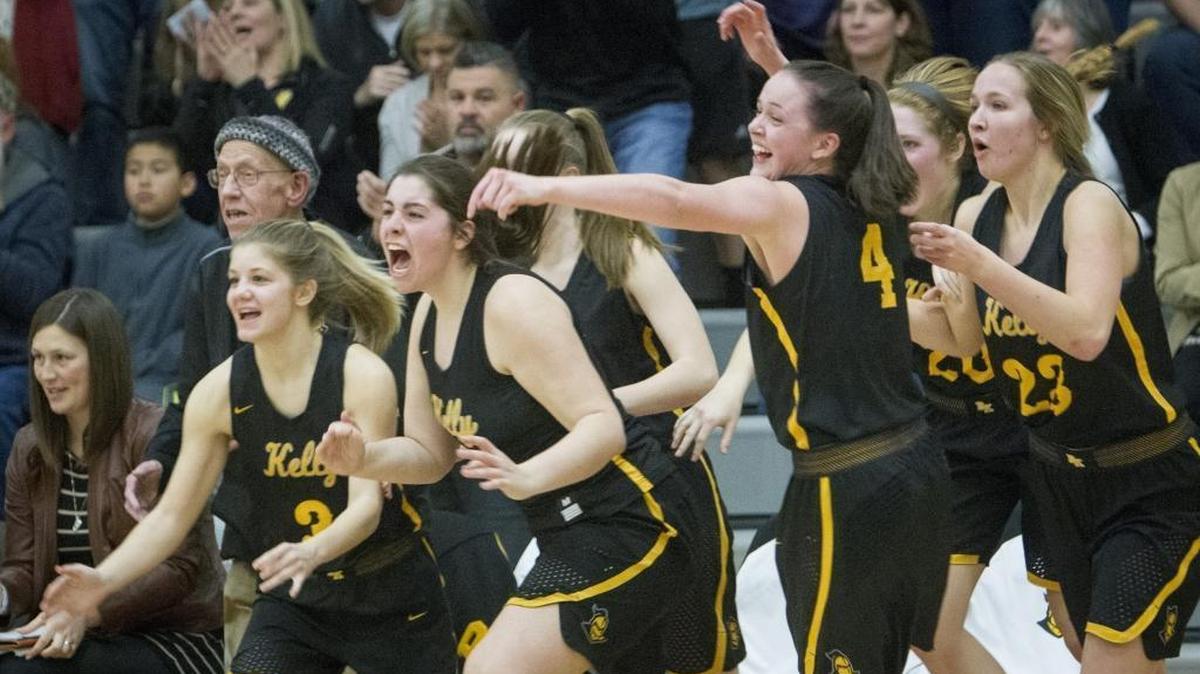 The Bishop Kelly bench erupts after the Knights won last year’s district title over Middleton.