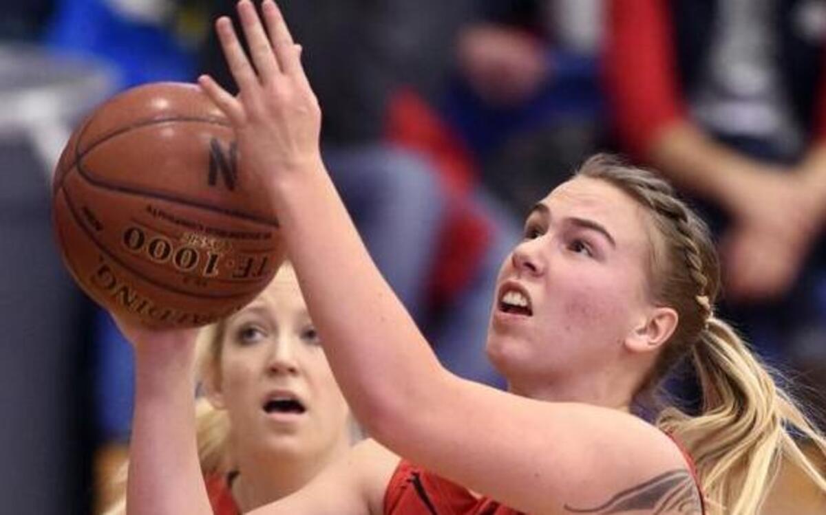 Richfield senior April Wood shoots against Rockland during the 1A Division II state semifinals Feb. 19 at Nampa High.