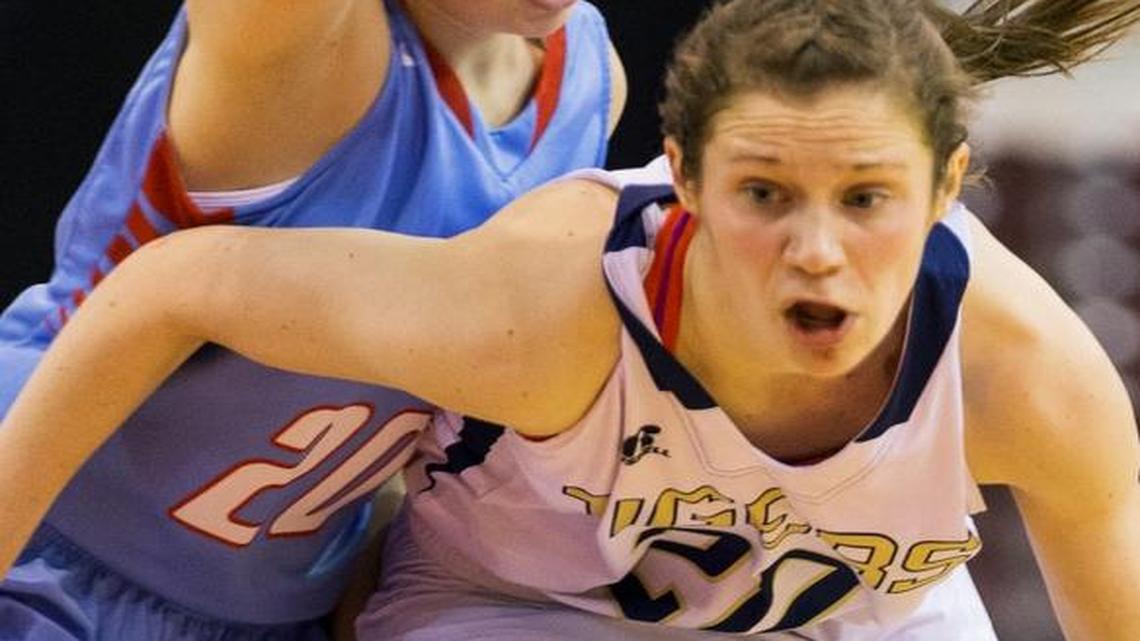 Timberlake High’s Allison Kirby drives past Marsh Valley High’s Hope Dunn during the second quarter.