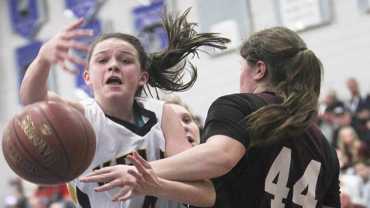 Guard Lydia Nieto, left, and the Bishop Kelly girls basketball team moved up from No. 4 to No. 2 in the latest 4A state media poll. The Knights received five first-place votes.