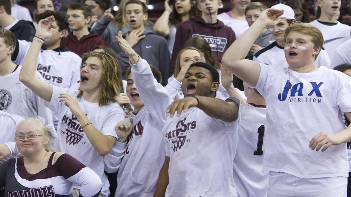 Centennial fans cheer on the Patriots as they beat Madison 50-35 in the semifinals to advance to the 5A state championship game at 8 p.m. Saturday at the Ford Idaho Center.