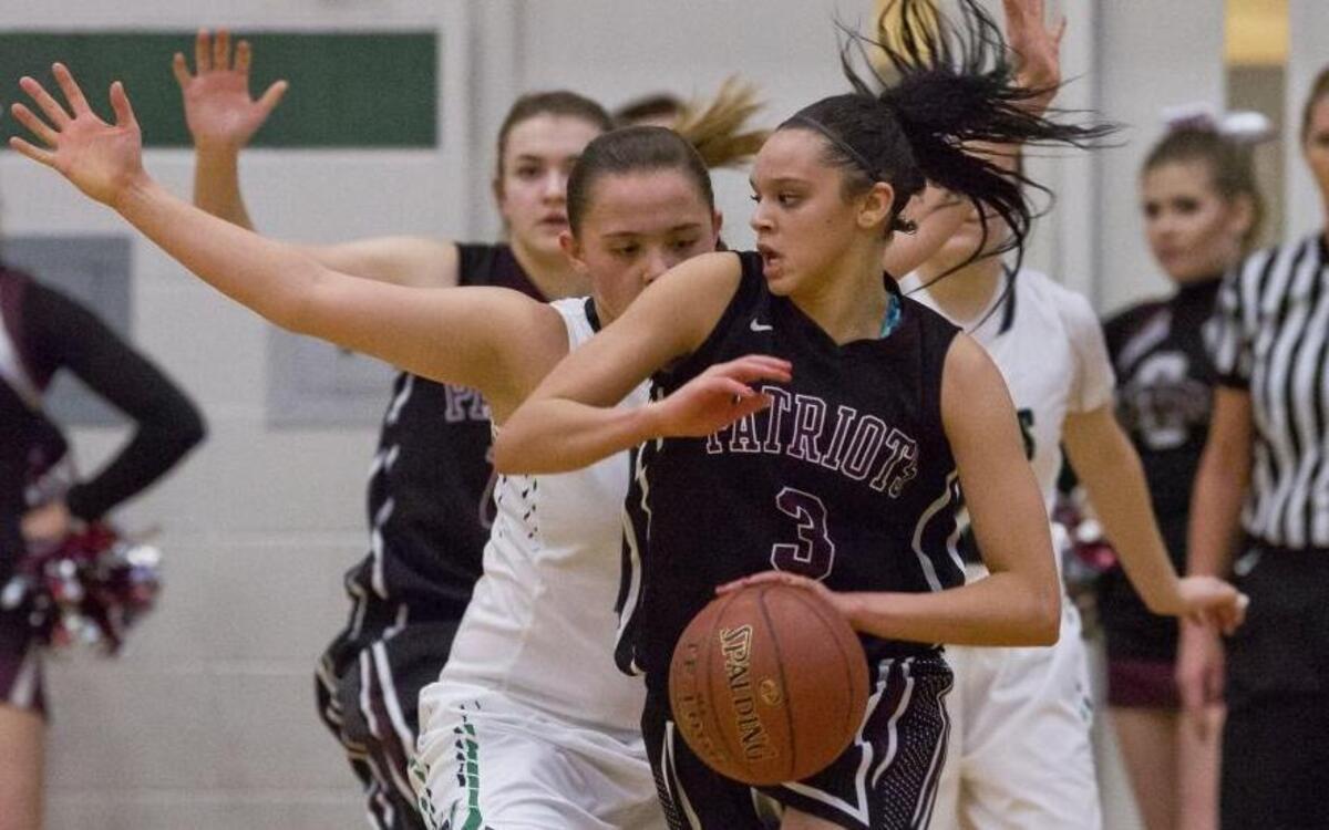 Centennial’s Tori Williams searches for room against Mountain View in the 5A District Three championship Feb. 12 at Eagle High.