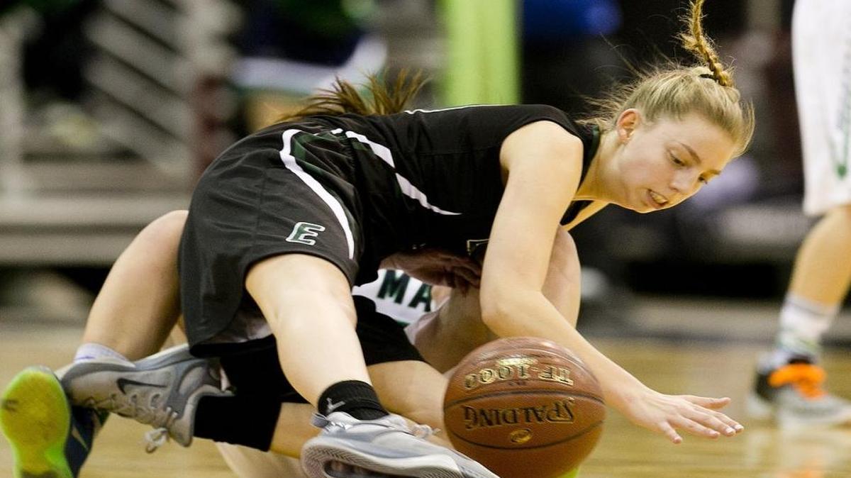 Eagle’s Janie King fights for the ball during last season’s 5A state girls basketball tournament at the Ford Idaho Center in Nampa. The Mustangs are ranked No. 1 in the state media poll for the second straight week.