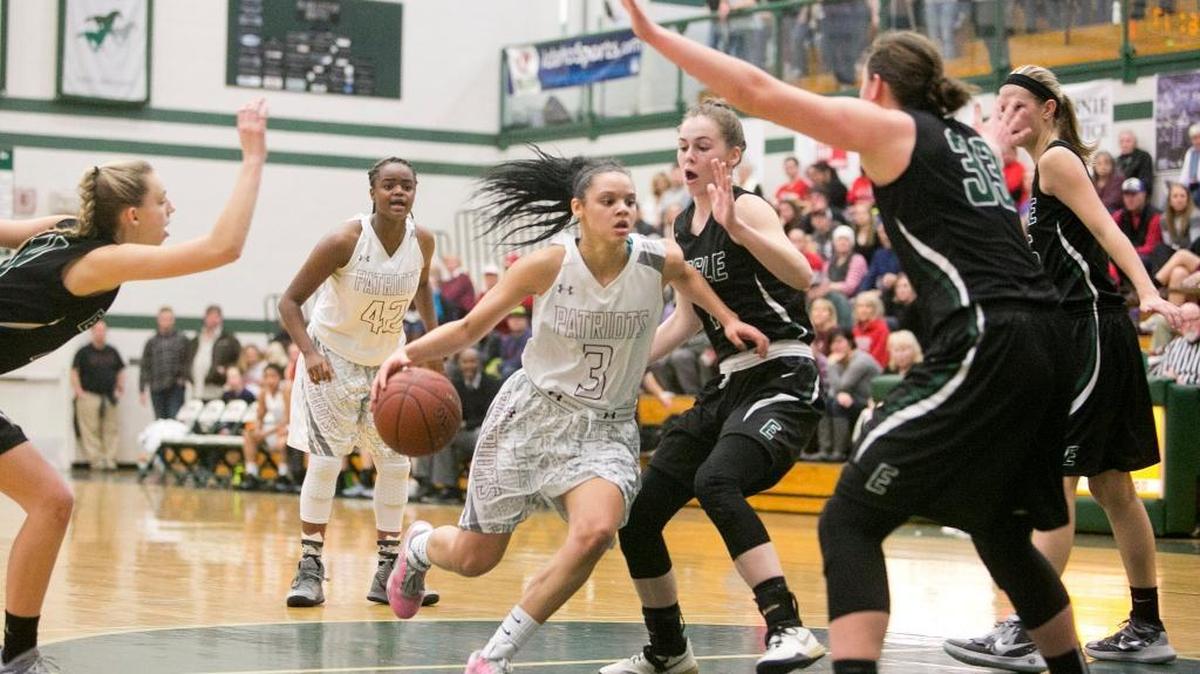 “When they started playing boys, you didn’t see them as girls. You saw them as basketball players,” said Hoop Dreams club coach Shambric Williams of Centennial teammates Tori Williams, dribbling, and Dominique Williams (No. 42 in back). “I think the speed, the strength really didn’t bother them. They just loved to play and compete.”