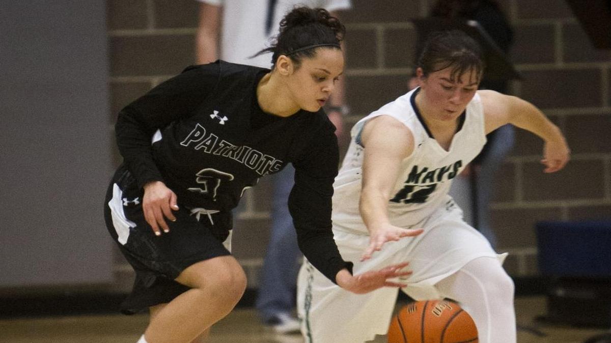 Centennial’s Tori Williams steals the ball from Mountain View’s Abby Kreiser.