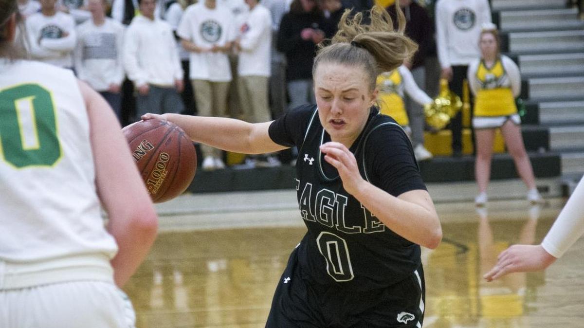 Eagle point guard Meghan Boyd slices through the Borah defense Jan. 12 at Borah.
